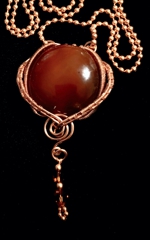 round carnelian pendant with czech crystal dangle